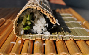 Photo of home made sushi on mat